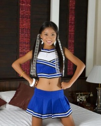 Thainee in a cheerleaders outfit