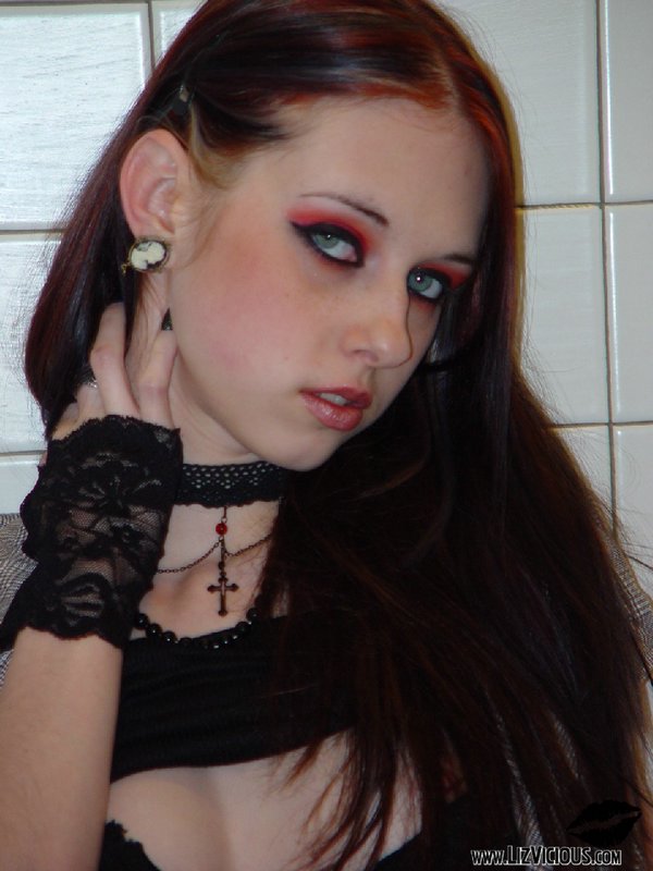 Slutty Liz Vicious Shows Some Pale Skin