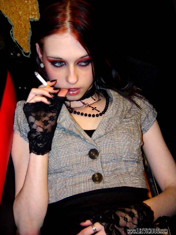 Slutty Liz Vicious Shows Some Pale Skin