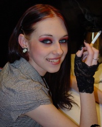 Slutty Liz Vicious Shows Some Pale Skin