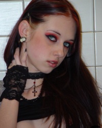 Slutty Liz Vicious Shows Some Pale Skin